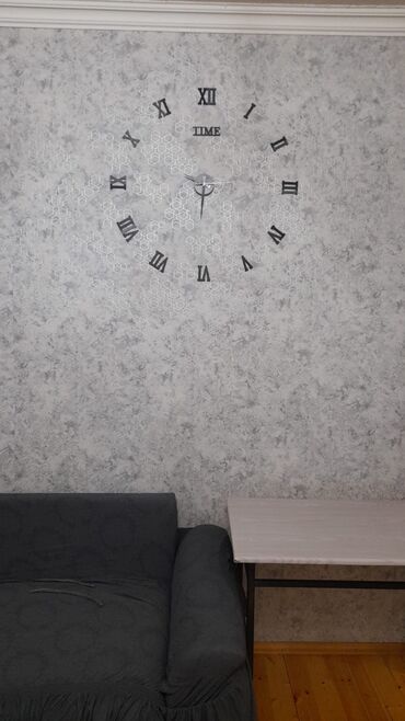 kend evlerinin dizayni: Hər növ divar saatlarının peşəkarlıqla quraşdırılması