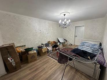 ev menzil: Satilir 5 mertebeli binanin 2 mertebesi 3 otaqli yeni temirli menzil — 7