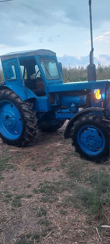 traktor new holland bazar: Mavi rəngli Belarus tipli təkərli traktor Texniki xüsusiyyətlər və — 1