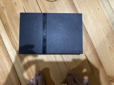 поко х4 про 5 ж: Игровая приставка PlayStation 2 черного цвета. Это классическая модель