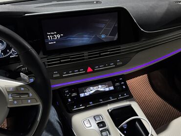 решетка на виндом: Элегантный седан Hyundai Grandeur белого цвета, оснащенный современной