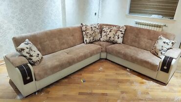 Açılan bazalı divan satılır. Əla vəziyyətdədir. Qiymət 150 azn. Ünvan