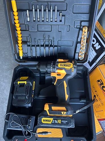 dewalt: Аккумуляторная дрель‑шуруповерт DeWalt 21V XR (Li-ion 1.5 Ah) в — 2