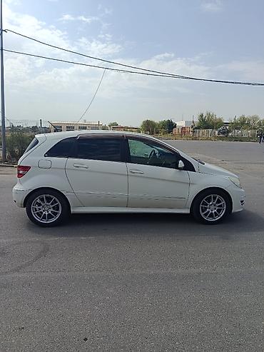 tesla model x: Mercedes-Benz B 180: 1.7 l | 2010 il Hetçbek — 8