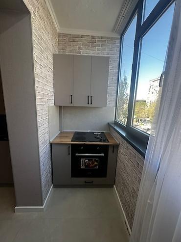 Кухонные гарнитуры: Кухонные гарнитуры на заказ - Современный минимализм: ровные фасады — 10