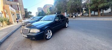 torpaqla barter masin deyisirem: Mercedes-Benz 200: 2 l | 1996 il Sedan