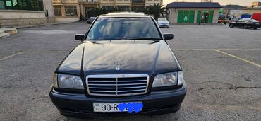 audi 100 1.8: Mercedes-Benz 200: 1.8 l | 1999 il Sedan