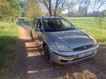 форд ескейп: Ford Focus в кузове универсал, серебристого цвета. Автомобиль