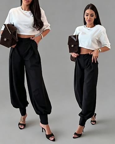 helanke m: Ženske pantalone sa širokim nogavicama i manžetnama
2300 din 
S M L — 6