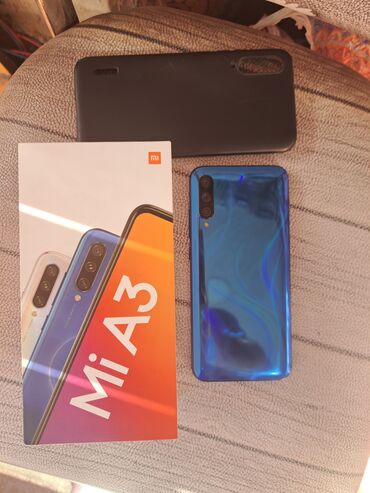 Mobil telefon və aksesuarlar: Xiaomi Mi A3, 128 GB, rəng - Göy, 
 Barmaq izi