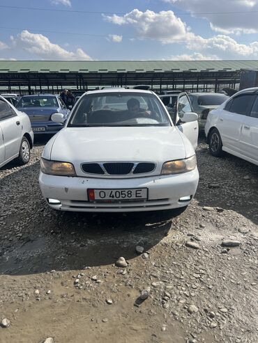 авто печ: Daewoo Nubira: 1998 г., 1.6 л, Механика, Бензин, Седан