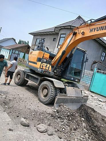 hyundai 145: Экскаватор, Hyundai, Колесный — 3