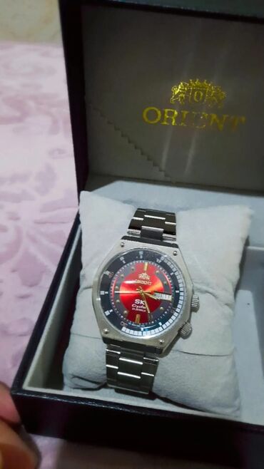 orient saat 1970: İşlənmiş, Qol saatı, Orient, rəng - Qırmızı