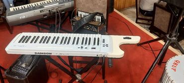 Sırğalar: Midi-klaviatura, Roland