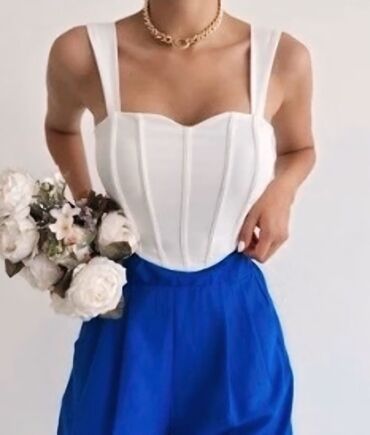 Plaşlar: Ağ rəngli qadın korset Çox az geyilib. Yenidir. Heç bir Qüsuru