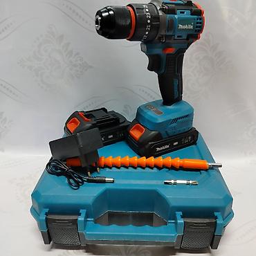 Аккумуляторная ударная дрель‑шуруповерт Makita (серия 48V) в