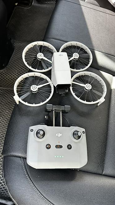 Квадрокоптер DJI с камерой и пультом дистанционного управление -