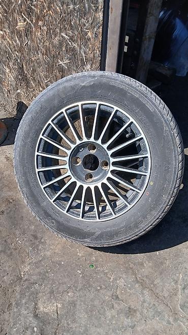 Колесо в сборе: литой диск с шиной Triangle 185/65 R14
