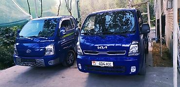 грузавой фура: Kia Bongo (K-series) с бортовой платформой — компактный городской — 1