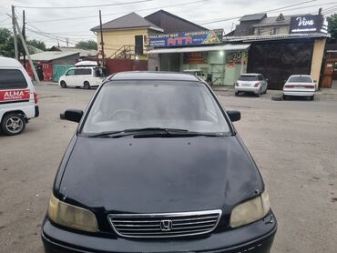 Honda: Минивэн Honda Odyssey, подходящий для семейных поездок и перевозки
