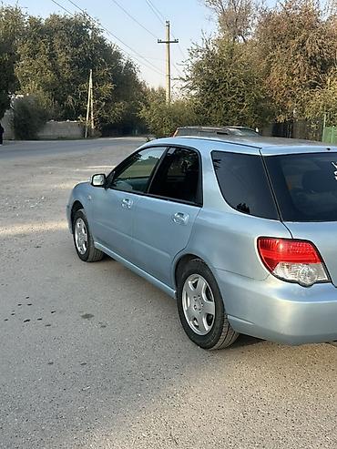 куго виш: Subaru Impreza: 2004 г., 1.5 л, Автомат, Бензин, Седан — 9