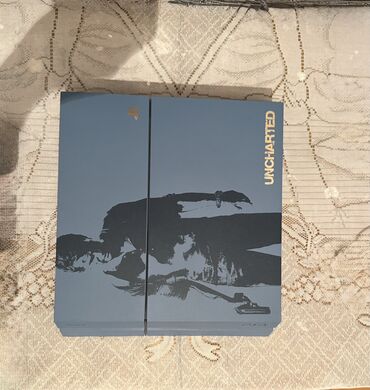 4 portlu modem: PlayStation 4 Uncharted Limited Edition oyun konsolu. Bu xüsusi