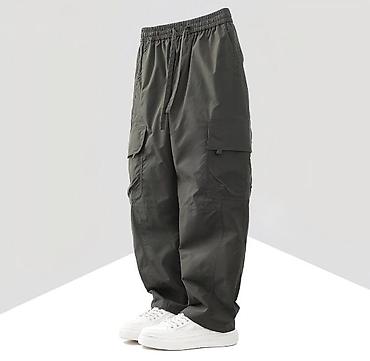 Брюки-карго свободного кроя в стиле oversize. Модель выполнена в