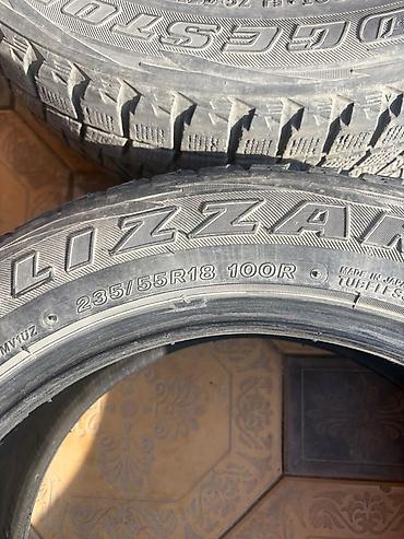 купить литые диски на авто: Комплект из 4 зимних шин Bridgestone Blizzak. - Размер: 235/55 R18 - — 3