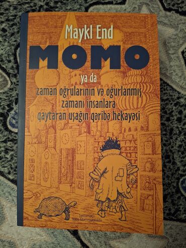 Kitablar, jurnallar, CD, DVD: Məhşur Momo kitabı