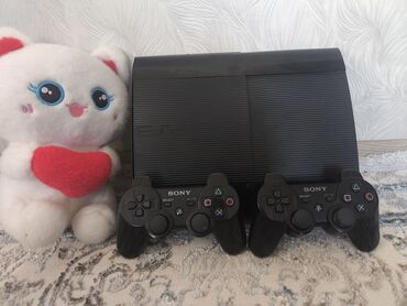 g102 бишкек: Игровая приставка Sony PlayStation 3 Super Slim (черная) с двумя