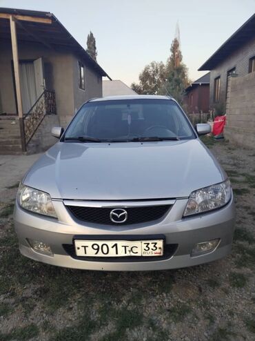 машина обмен на скот: Mazda Familia: 2003 г., 1.6 л, Автомат, Бензин, Седан