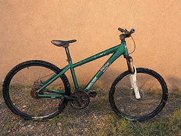 2 ci sinif defteri: Dağ velosipedi – yaşıl rəngli, sərt quyruq (hardtail) aluminiy çərçivə — 2
