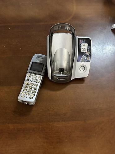 кнопкалы телефонлар: Panasonic KX-TG2050MLS simsiz ev/ofis telefonu və baza stansiyası - — 4