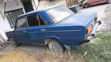 шины на масквич: ВАЗ (Lada) 2106, синий седан классической серии. Кузов: - 4 двери