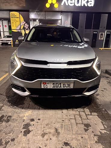 салон машины: Kia Sportage: 2022 г., 1.6 л, Автомат, Гибрид, Кроссовер — 1