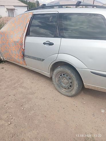 салон машины: Ford Focus: 2003 г., 1.6 л, Бензин, Универсал — 1