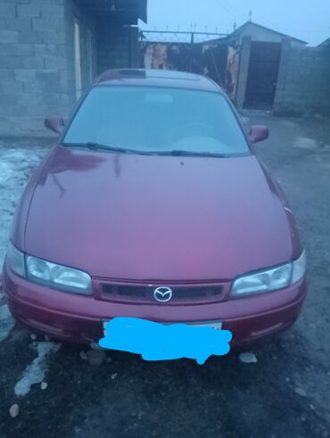 мазда з23: Mazda 626 в кузове седан. Автомобиль красного цвета с механической