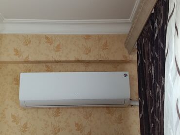 Kondisionerlər: Divar tipli split kondisioner – UJINARO (brend loqosu üst paneldə) — 2