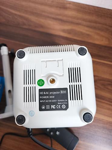 Proyektorlar: Portativ Proyektor – BT 5.0 & Wi‑Fi Əsas xüsusiyyətlər: - Ev — 5