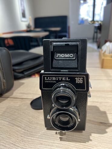 Фотоаппараты: Советский среднеформатный двухобъективный зеркальный фотоаппарат ЛОМО — 3