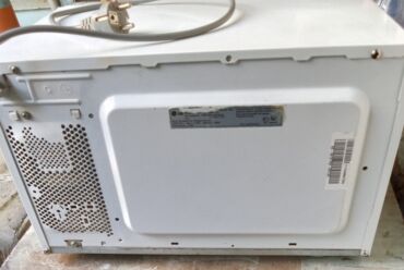 mikrovolnovka qiymetleri: Mikrodalğalı soba LG, Ayrıca dayanan, rəng - Ağ, İşlənmiş