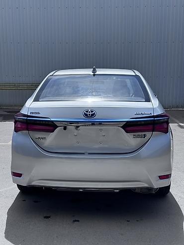 byd e1: Toyota Corolla: 2019 г., 1.8 л, Робот, Гибрид, Седан — 5