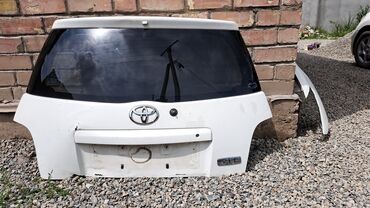 калпаки на ист: Крышка багажника Toyota 2003 г., Б/у, цвет - Белый,Оригинал