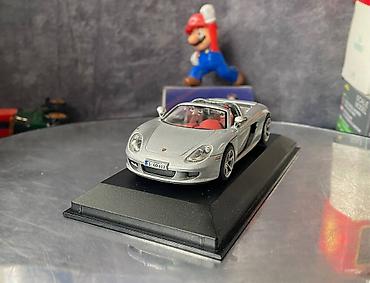 Avtomobil modelləri: Коллекционная модель Porsche Carrera GT Cabriolet type 980 silver — 8