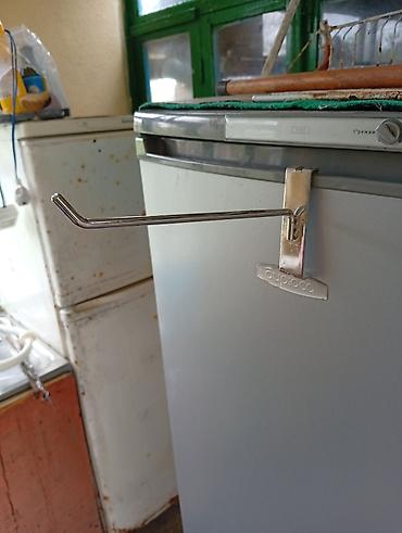 vitrini: 50 faiz endirim .market ucun xrdavat asdamaga asilqanlar ikinci eldi 1 — 1