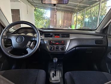 mitsubishi evo 8: Mitsubishi Lancer: 2005 г., 1.6 л, Автомат, Бензин, Седан — 6