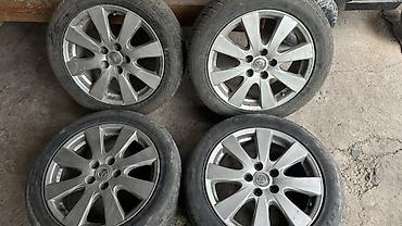 Комплект из 4 легкосплавных дисков Toyota с шинами.оригинал!!!