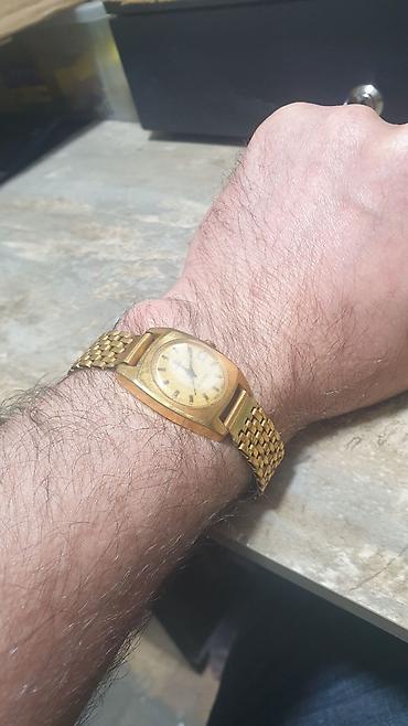saatlar type 0: Klassik üslublu mexaniki qol saatı - Korpus: qızılı tonlarda metal — 1