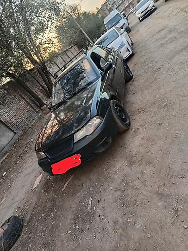 Daewoo Nexia: 2011 г., 1.5 л, Механика, Бензин, Седан
