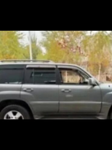срочно в связи с переездом: ОЧЕНЬ СРОЧНО !!! Внедорожник Lexus LX 470 серого цвета с рейлингами на